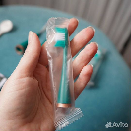 Электрическая зубная щетка