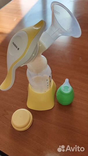 Молокоотсос medela ручной