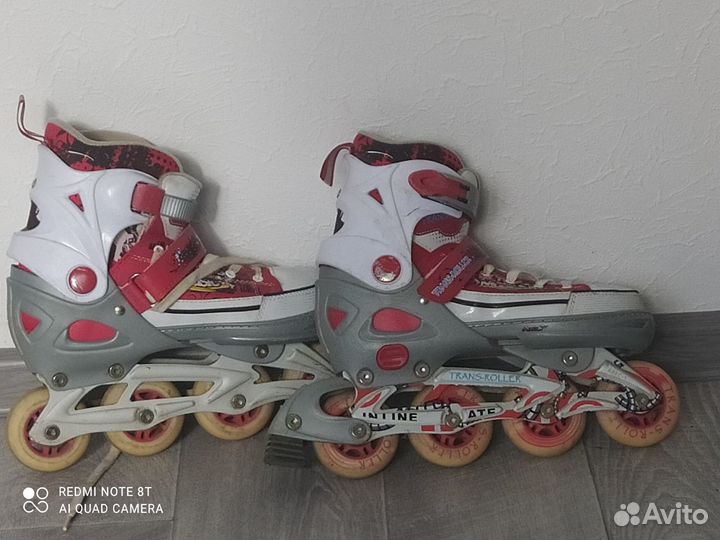 Роликовые коньки