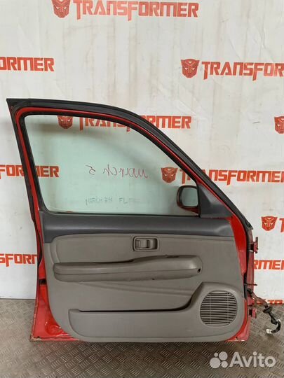 Обшивка двери передняя левая Ниссан Марч К11