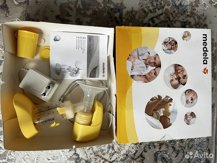Молокоотсос medela электрический