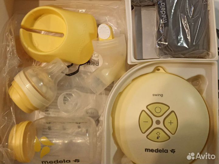 Молокоотсос medela электрический