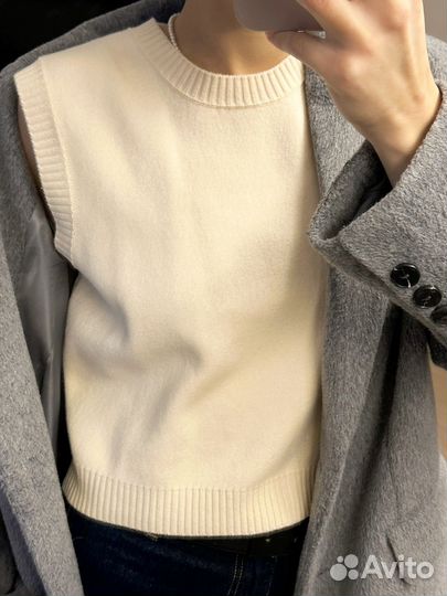 Шерстяная жилетка