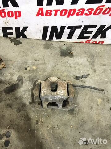 Суппорт передний левый Toyota Opa