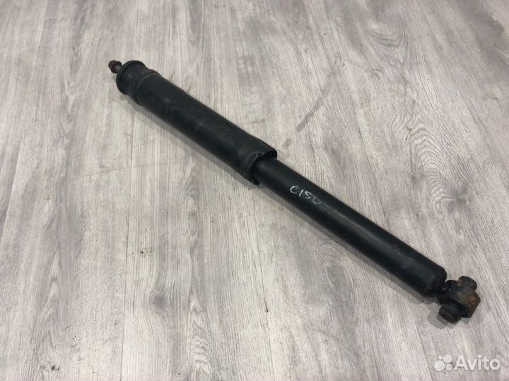Амортизатор задний левый Toyota Corolla E150 2006