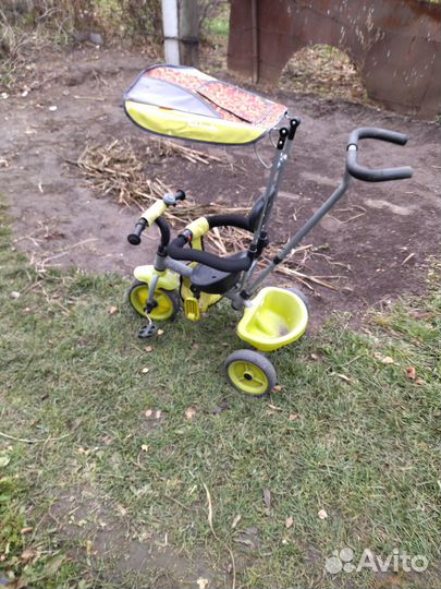 Трехколесный велосипед с ручкой