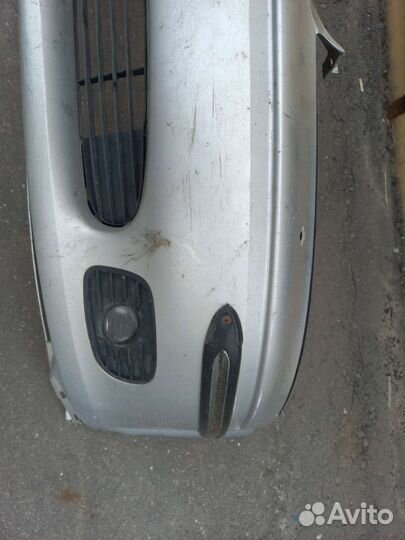 Бампер передний opel vectra серебристый