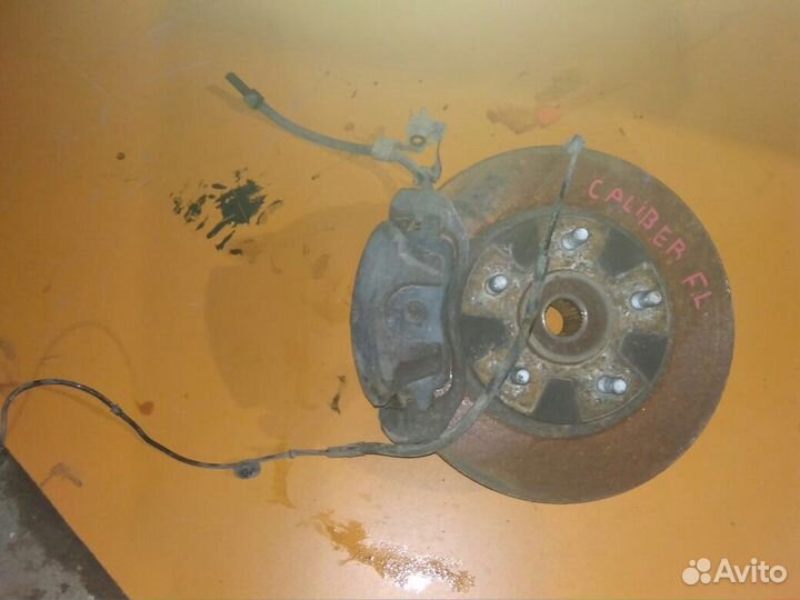 Суппорт тормозной передний на Dodge Caliber