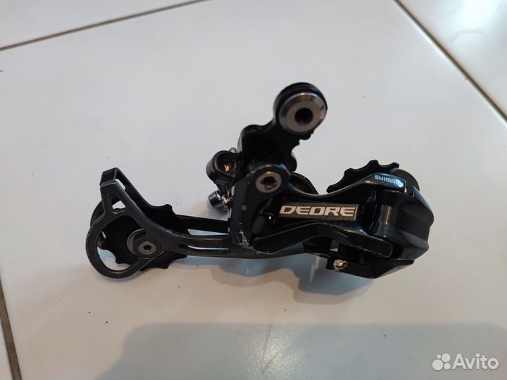 Задний переключатель shimano deore 9 скоростей