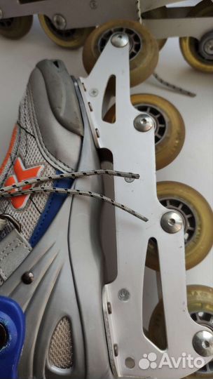 Роликовые коньки