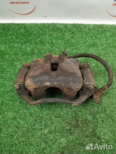 Суппорт тормозной передний правый Kia Ceed хетчбэк