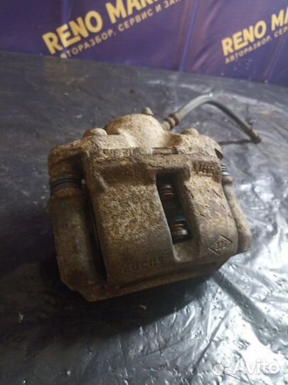 Суппорт тормозной передний левый Renault Logan LS