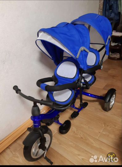 Велосипед-коляска для двойни