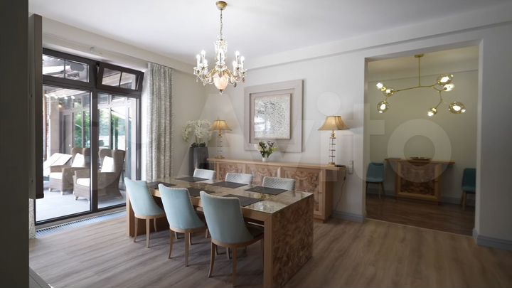 Коттедж 310 м² на участке 15 сот.