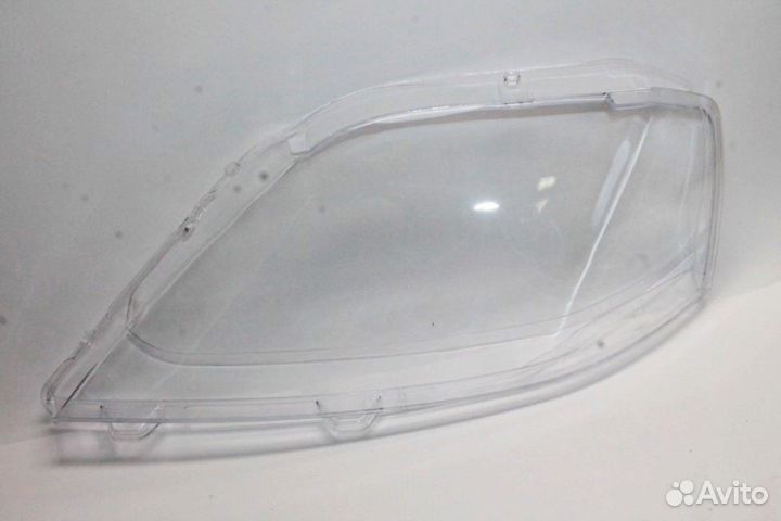 Рено Логан стекло фары передней левой 2010-2014г
