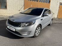 Kia Rio 1.6 AT, 2012, 108 000 км, с пробегом, цена 835 000 руб.