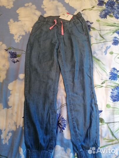 Новые джинсы на девочку 146