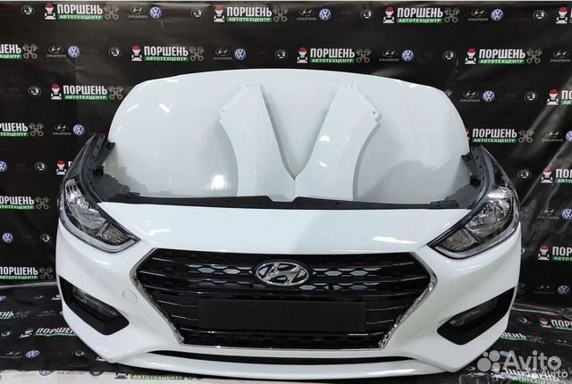 Передний бампер белый Hyundai Solaris 2 рест