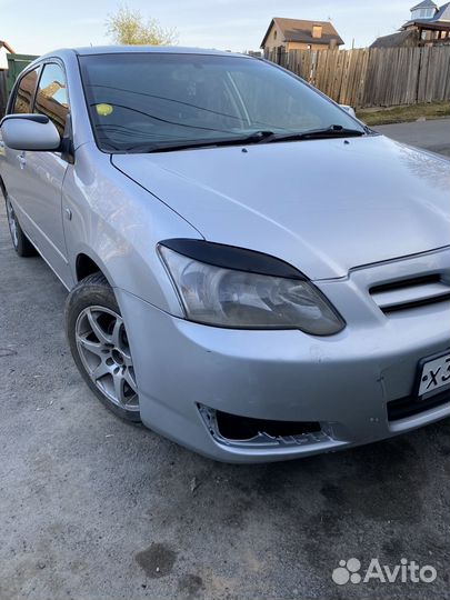 Реснички на фары для Toyota Allex Runx 2004-2006