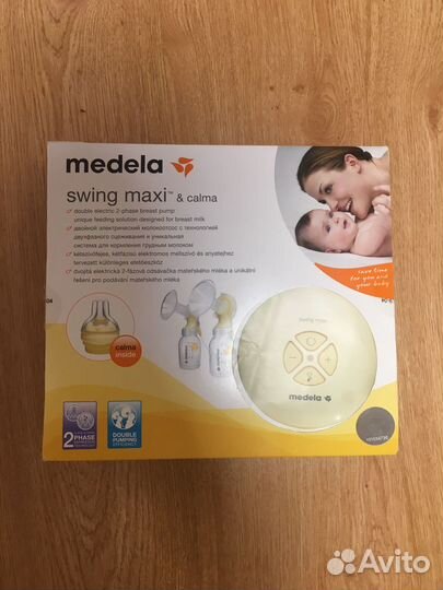 Молокоотсос medela электрический