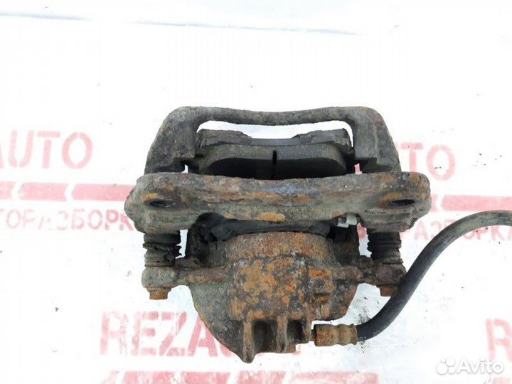 Суппорт тормозной передний левый Mitsubishi