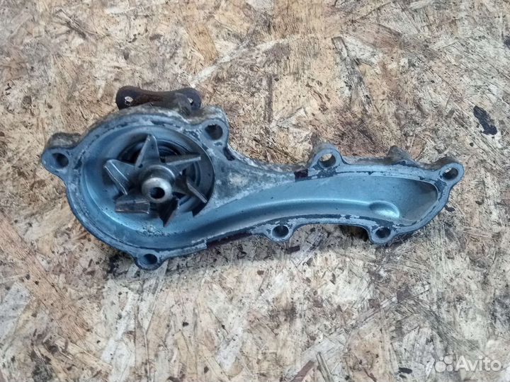 Помпа водяная Nissan Almera N16 1.8