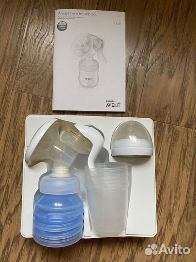 Молокоотсос и набор бутылочек с ершиком