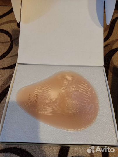 Протез молочной железы