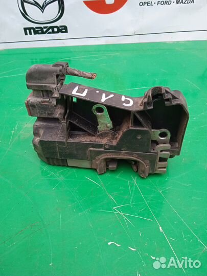 Замок двери передний левый Opel Astra G