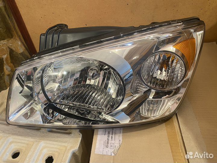 Фара левая KIA Cerato LD (04-06) оригинал