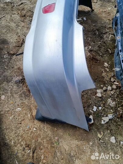 Бампер задний Kia Spectra