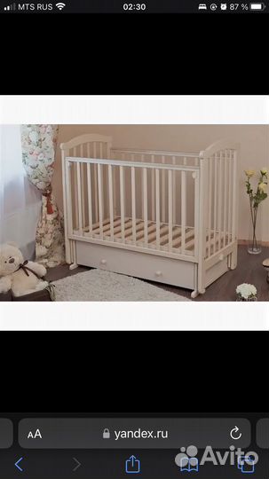 Детская кроватка с продольным маятником