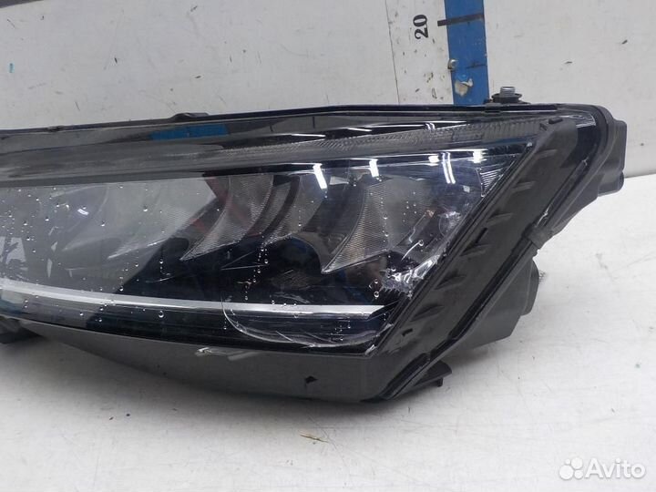 Фара левая Skoda Octavia
