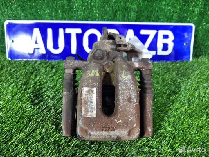 Суппорт тормозной задний левый Peugeot 308 xэтчбек