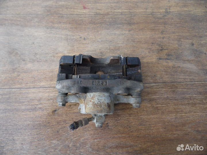 Суппорт тормозной передний правый Chevrolet Lanos