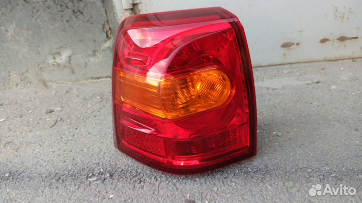 Фонарь задний левый на крыло Тойота 200