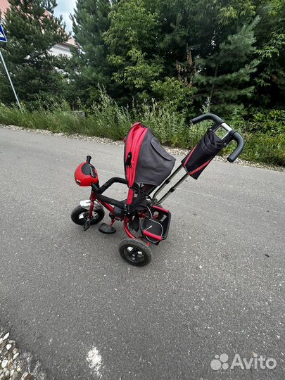 Детский трехколесный велосипед с ручкой