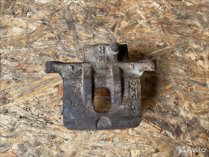 Суппорт задний правый без скобы Mitsubishi Lancer