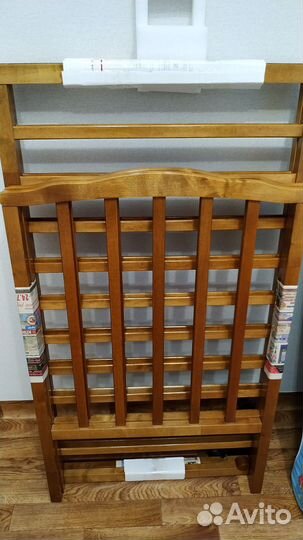 Детская кроватка с продольным маятником