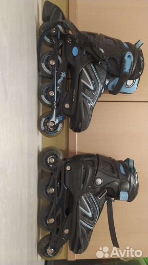 Роликовые коньки