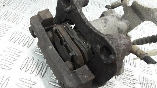 Суппорт тормозной задний левый toyota urban cruise