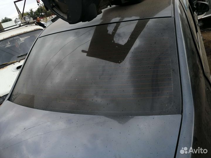 Заднее стекло на рено логан