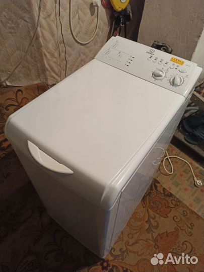 Стиральная машина с вертикальной загрузкой