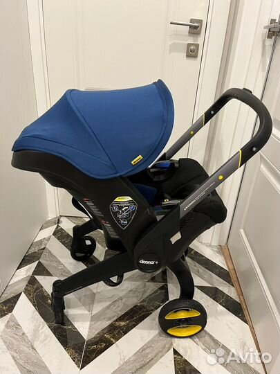 Коляска автолюлька doona