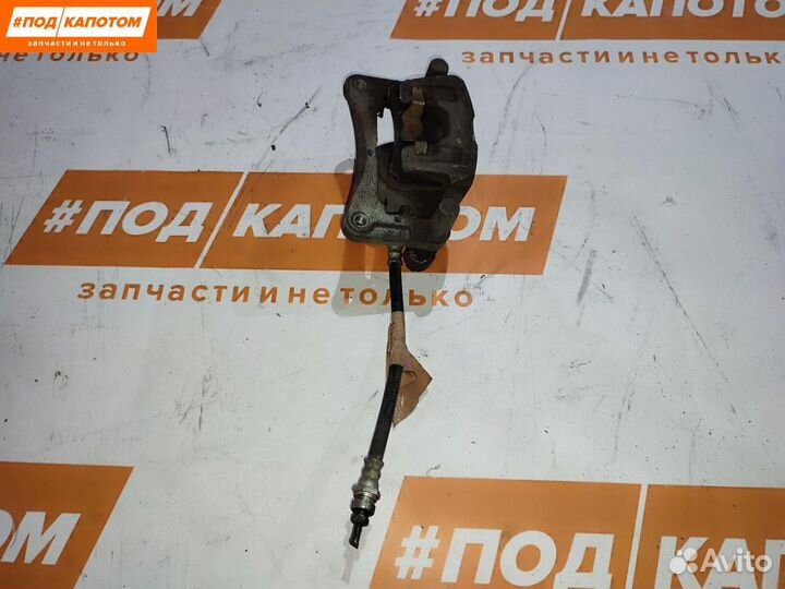 Суппорт тормозной задний правый Mitsubishi Lancer