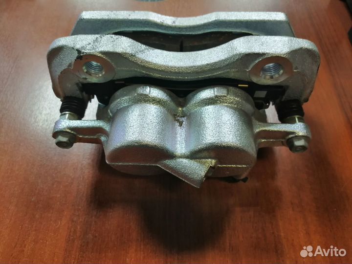 Передний левый суппорт на Газель Next