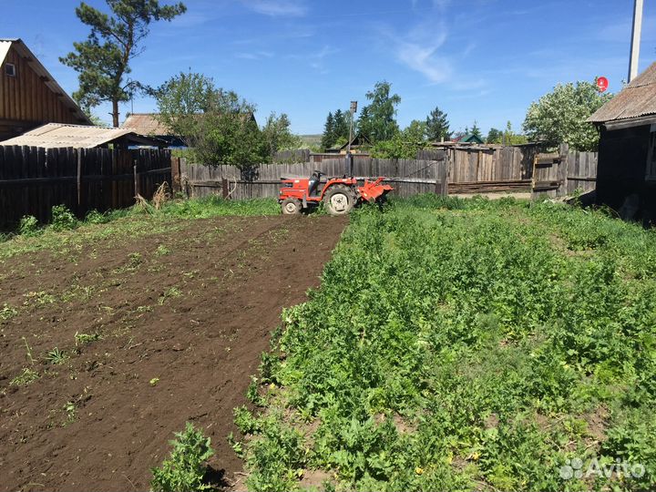 Вспашка земли (минитрактор)