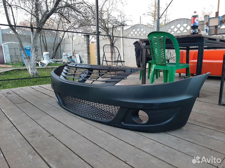 Бампер на рено логан