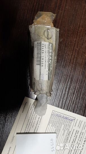 Крышка омывателя фар Nissan Tiida 28659EM30A