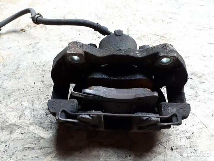 Суппорт передний левый Opel Astra H 2004-2014